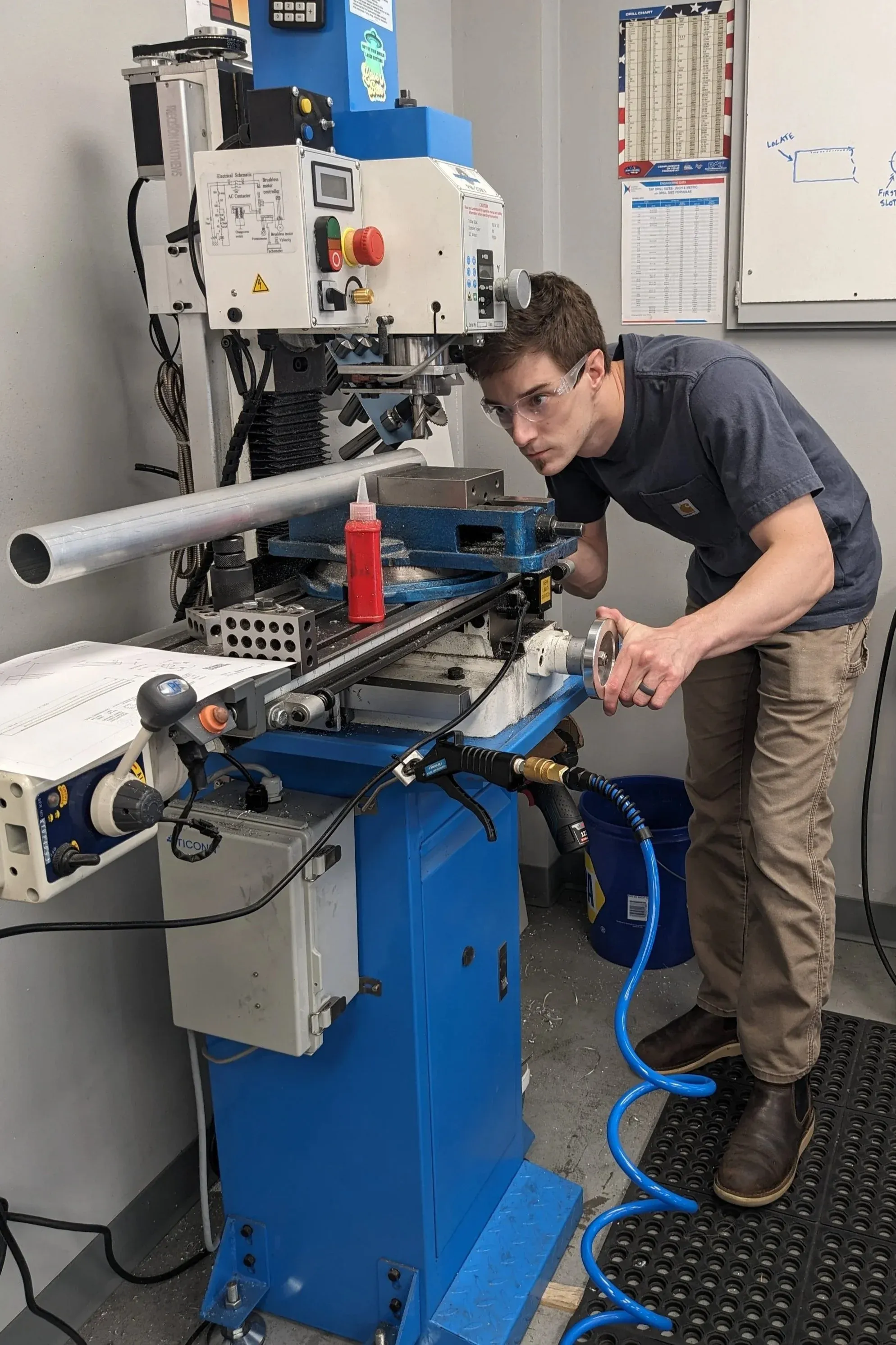 Dan Schaner setting up a long part on the milling machine